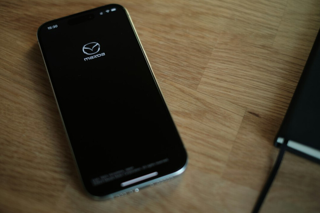 Smartphone on a desk showing a security scan progress screen