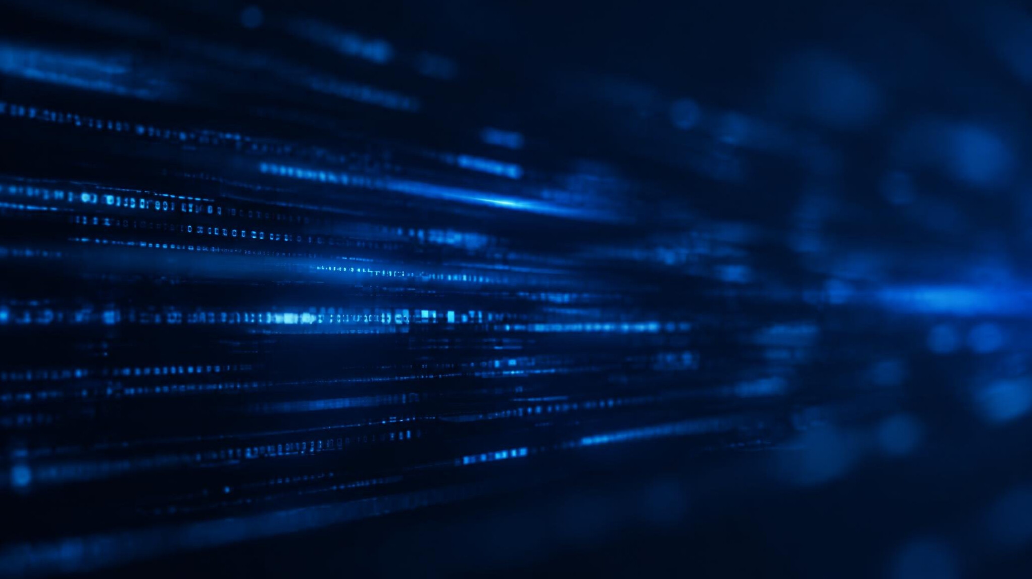 Dark blue abstract digital code streaks on a computer screen